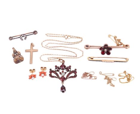 A collection of 19th century and later jewellery, including a garnet pendant in a spray design with pendant drop, measuring 3