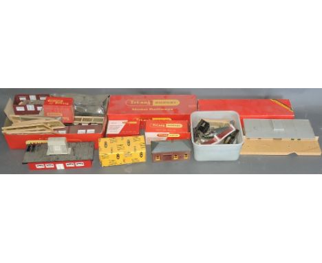 A quantity of Hornby Dublo buildings and trackside equipment, stations and engine sheds etc., some boxed also items from othe