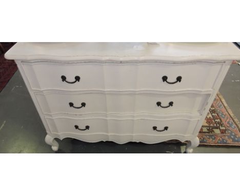 A modern French Provincial style white painted commode, the shaped front fitted 3 drawers on cabriole feet, W:150cm