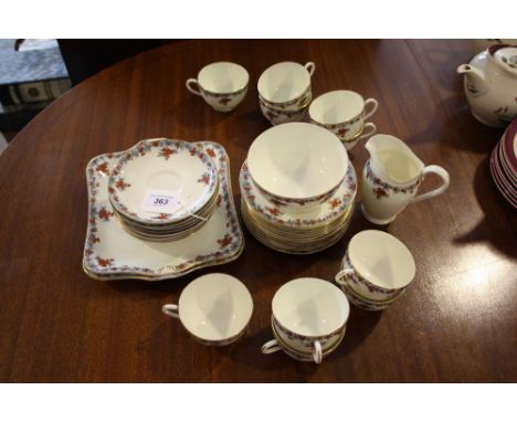 A Royal Worcester 36 piece porcelain part tea service decorated with floral borders