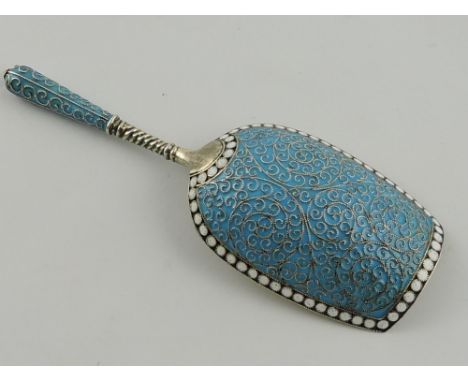 A Russian caddy spoon, Gustav Gustanvovich Klingert, with a gilded bowl bearing purity marks, the reverse of foliate scrolls 