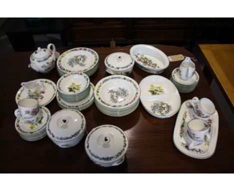 A Royal Worcester herbs pattern 53 piece part dinner and tea service, including 3 tureens, teapot, pie dish etc.