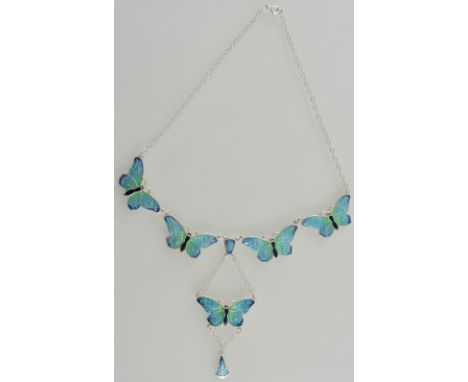 A white metal and enamel necklace modelled in the form of butterflies, stamped Sterling, 24g.