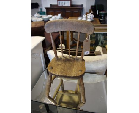 A Victorian elm and ash Windsor comb back child's chair