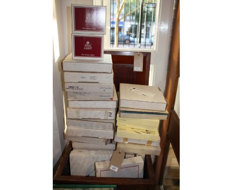 A collection of approximately 37 assorted boxed limited edition plates including examples by Spode and Poole,together with tw
