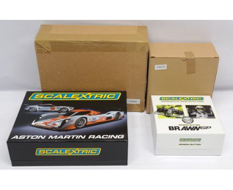 Scalextric pair to include (1) C3047A Brawn GP - Jenson Button, No. 1692 of 5000; (2) C3055A Aston Martin Racing - DBR9 &amp;
