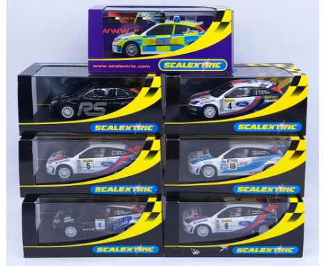 Scalextric Ford Focus Group, 1:32nd Scale Cars to include (1) C2175 Iridium No.; (2) C2176 Works 2000 No.5; (3) C2351 WRC "RS