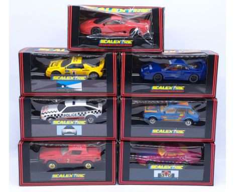 Scalextric, a group of 1:32nd Scale Slot Cars to include (1) C281 TR7 Rally; (2) C362 Rover 3500 Police Car; (3) C429 Ford RS