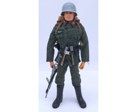 Palitoy Action Man vintage loose German Stormtrooper, blonde flock hair, gripping hands, wearing tunic, trousers, jackboots, 