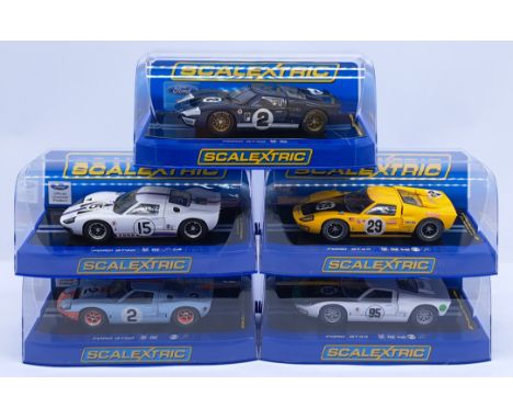 Scalextric Ford GT40 Group, 1:32nd Scale Cars to include (1) C3066 MkII - 1966 D. Gurney No.2; (2) C3211 MkII - 1970 Sebring 