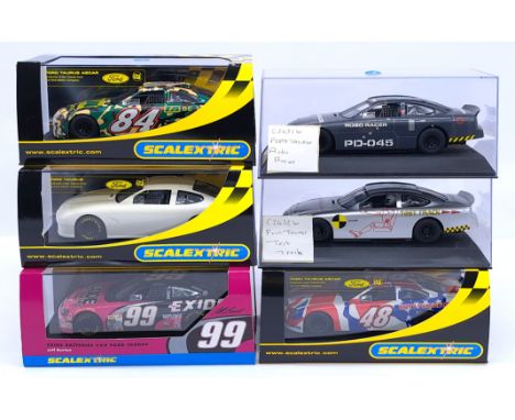 Scalextric Ford Taurus Group, 1:32nd Scale Cars to include (1) C2141 Exide Batteries #99 - Jeff Burton; (2) C2435 Plain White