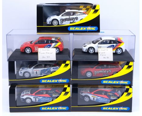 Scalextric Ford Focus Group, 1:32nd Scale Cars to include (1) C2411 WRC "Works 2002 No.5"; (2) C2489 WRC "Works 2003 No.4"; (