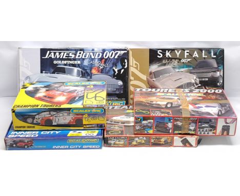 Scalextric, a group of Slot Racing Sets to include C899 Team Calibra; C1194 Inner City Speed; James Bond 007 - Skyfall; James