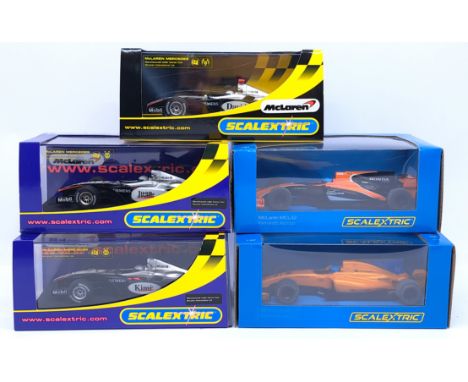 Scalextric, a group of 1:32nd Scale Slot Racing Cars to include (1) C2554 McLaren Mercedes F1 MP4-16 - David 2004; (2) C3956 