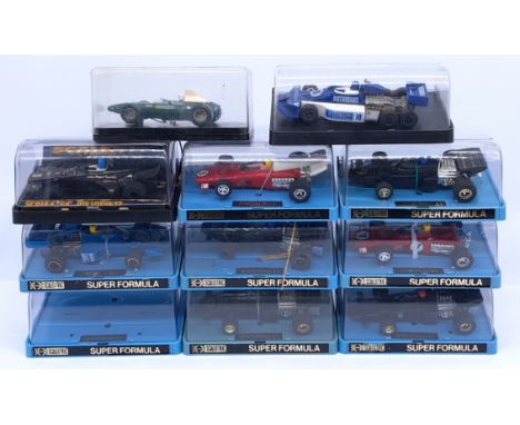 Scalextric F1 Racing Slot Cars to include C.025 Ferrari 312, C.050 JPS Formula 1,&nbsp;C.121 Elf Tyrrell, C.126 JPS Lotus 77,
