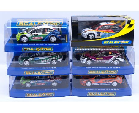 Scalextric Ford Focus WRC Group, 1:32nd Scale Cars to include (1) C2893 RS Stobart No.7; (2) C2892 2008 No.4; (3) C3090 Stoba