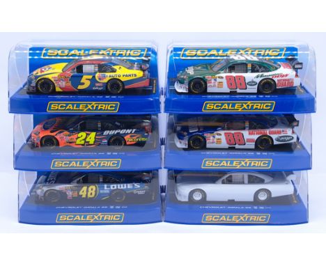 Scalextric Chevrolet Impala SS Group, 1:32nd Scale Cars to include (1) C2894 - Jimmie Johnson No.48; (2) C2895 - No.88 (AMP E