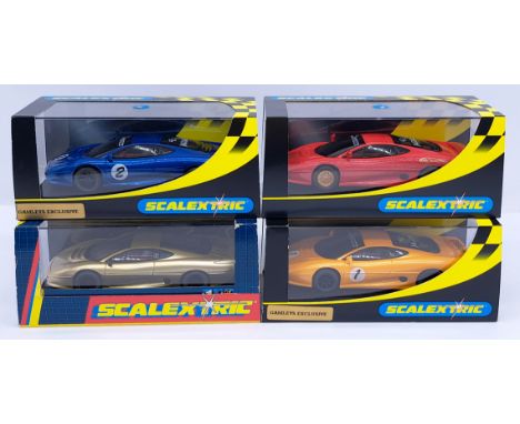 Scalextric Jaguar XJ220 Group, 1:32nd Scale Cars to include (1) C2083; (2) C2323 Blue; (3) C2324 Orange; (4 C2330 Hamleys - a