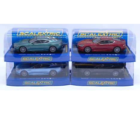 Scalextric Aston Martin DBS Group, 1:32nd Scale Cars to include (1) C2994 - Red; (2) C2982 - Top Gear: (3) C3089 - Green; (4)