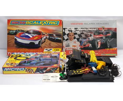 Scalextric, a group of Micro Slot Racing Sets to include G094 World Championship; G1034 Vodafone McLaren Mercedes - Lewis Ham