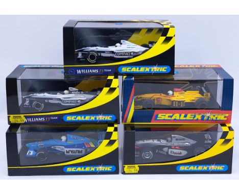 Scalextric, a group of 1:32nd scale Racing Slot Cars to include (1) C2079 Jordan F1; (2) C2261 McLaren Mercedes; (3) C2265 Wi