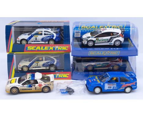 Scalextric Ford Group, 1:32nd Scale Cars to include (1) C2171 Escort No.7 (some discolour); (2) C2174 Escort No.4; (3) C3284 