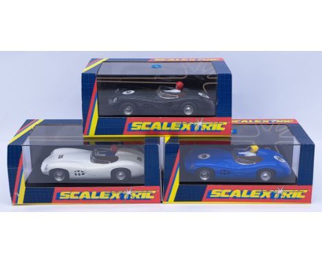Scalextric Aston Martin DBR1 Group, 1:32nd Scale Cars to include (1) C2061 Black; (2) C2062 White; (3) C2063 Blue - all appea