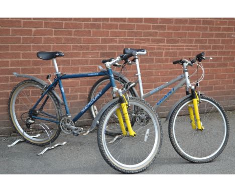 A gentleman's Mercury Millennium mountain bike; another, ladies Boulder Alulite Giant mountain bike (2)