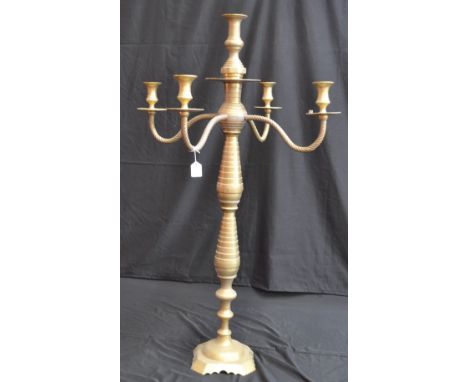 One massive brass floor standing five light candelabra, with campana shaped sconces, ring turned columns, mid century