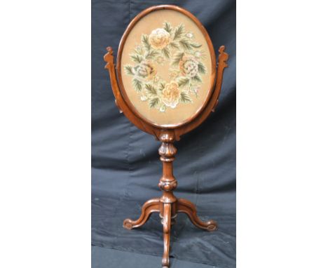 An Victorian oval rosewood firescreen C1860 