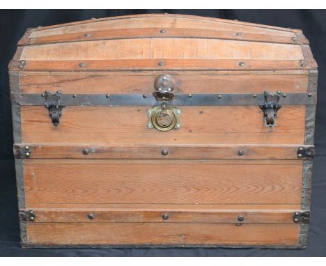 A domed pine trunk, metal mounted, the interior with oval brass plaque, Thomas Wylie, Dungannon
