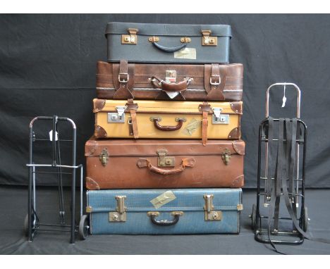 Vintage Luggage - a Cheney suitcase; other suitcases, early 20th century and later (5); two sets of carrying wheels