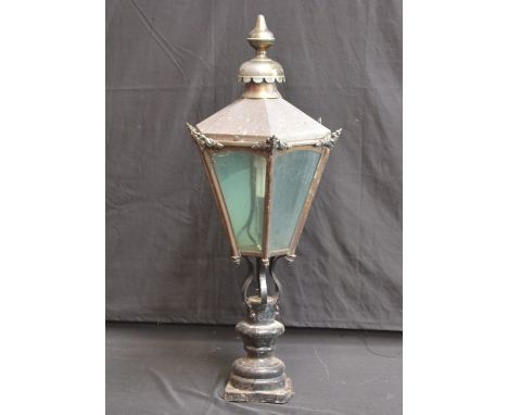 A Victorian design garden lantern, the glass lamp fitted for electricity, cast iron base, 84cm high, 20th century