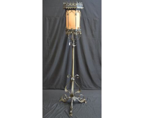 An Art Nouveau floor standing lamp, castellated hood, approx. 180cm in height