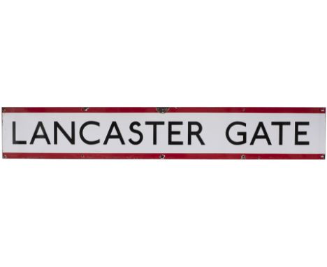London Underground enamel frieze sign LANCASTER GATE measuring 57in x 9in. In very good condition with some edge chipping.