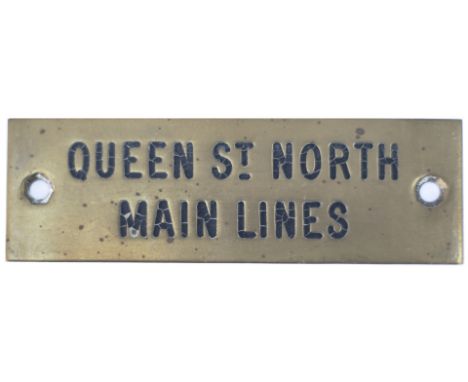 GWR machine engraved brass shelf plate QUEEN ST NORTH MAIN LINES. In very good condition with original black wax infill ex Ca