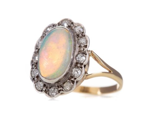 LARGE OPAL AND DIAMOND CLUSTER RING, set with cabochon opal within a halo of old cut diamonds, 20mm long, marked 18CT, size R