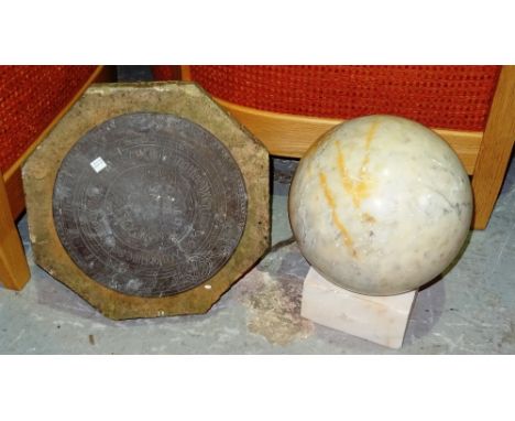 A similar pair of 20th century alabaster spherical balls on stand and a carved stone sundial top with plate, (a.f), (3).   I8