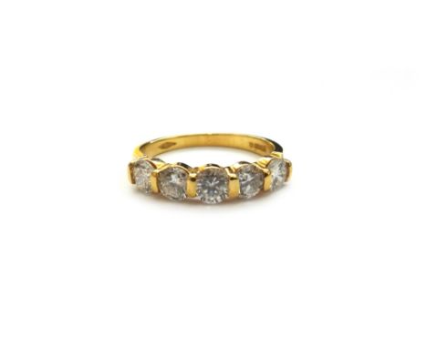 An 18ct gold and diamond five stone ring, mounted with a row of circular cut diamonds, the diamonds weigh approx total 1.15 c