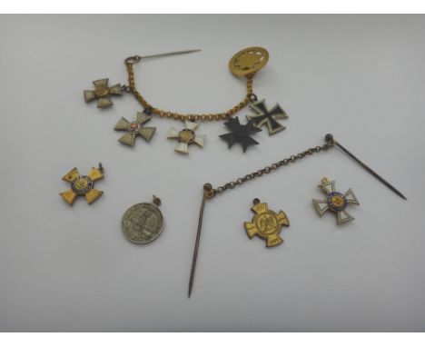 Nine mostly Imperial German dress miniature awards and medals, including an iron cross, comprising five mounted to a chain, h
