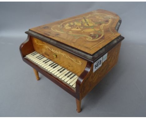 A Franklin Mint 'House of Faberge' novelty cylinder music box, modern, in the form of a miniature grand piano, containing fiv