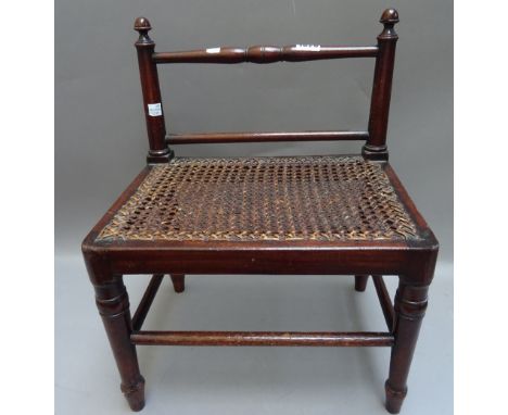A Regency mahogany and cane footstool on turned supports, 36cm wide x 44cm high x 26cm deep, together with a 19th century mah