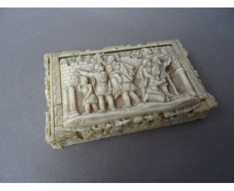 A Continental carved ivory snuff box, 19th century, each panel independently carved with a mythological scene, interior prove