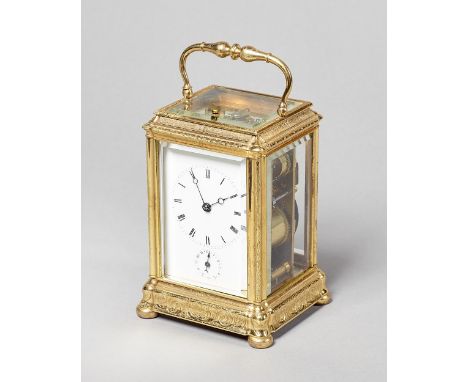 A French gilt brass grande and petite sonnerie engraved gorge case carriage clockBy Moser, Paris, No. 3671, circa 1870The cas