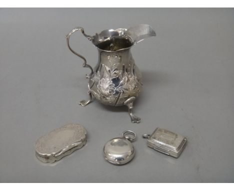 Silver, comprising; a George IV rectangular vinaigrette, the grille engraved and pierced with a cornucopia and floral motif, 