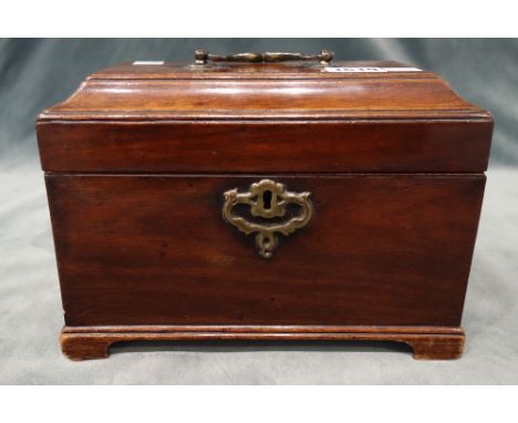 A mid-18th century mahogany rectangular tea caddy, lacking interior, on bracket feet, 23.5cm wide x 20cm high x 13cm deep.