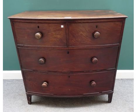 A Regency mahogany bowfront chest of two short and two long graduated drawers, on bracket feet, 102cm wide x 97cm high x 60cm