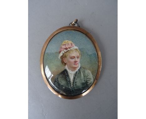 A 19th century Continental school portrait miniature on ivory, depicting a seductive young lady wearing a yellow dress, in a 