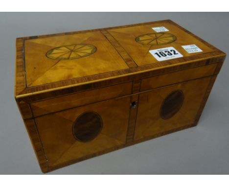 A George III marquetry inlaid Kingwood banded satinwood rectangular tea caddy, with twin lidded interior and mirror inset to 