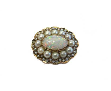 A gold, opal and cultured pearl set oval clasp, claw set with the oval opal at the centre, in a surround of half cultured pea